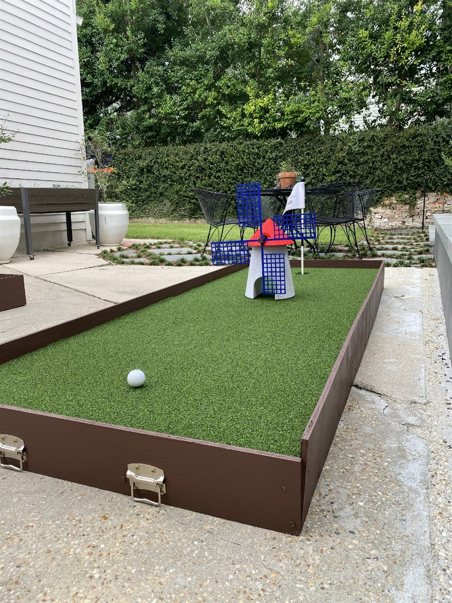 Windmill hole with golf ball in play